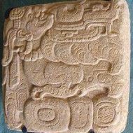 Itzamna old carving